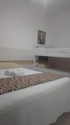 Postel nebo postele na pokoji v ubytování Hotel Natal