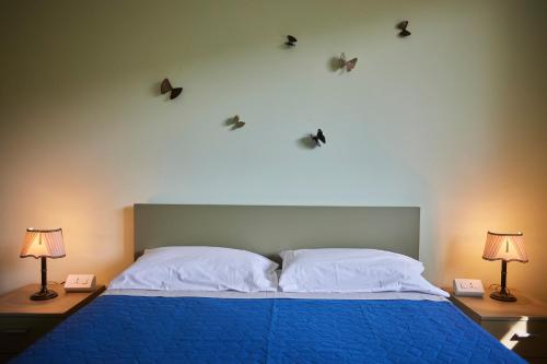 Cama o camas de una habitación en Casa Ierardi - Appartamento Arona Bellavista