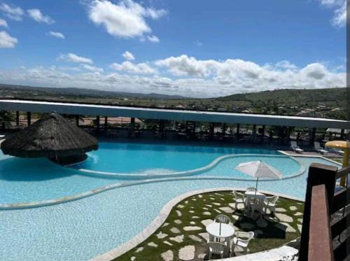 Bazén v ubytování Flat Fazenda Monte Castelo Gravatá nebo v jeho okolí
