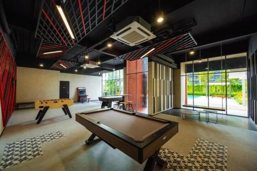 a large room with a pool table in it at Gravit 8 , Ashino in Klang
