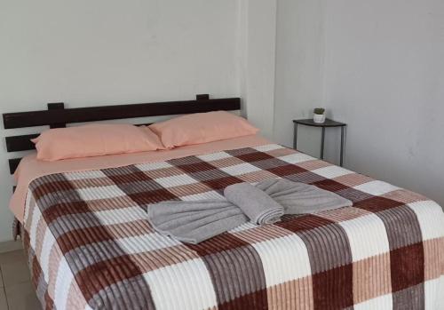 Postel nebo postele na pokoji v ubytování Mindomundo Home
