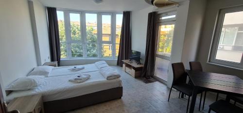 Postel nebo postele na pokoji v ubytování Къща за гости Беглик Таш 2