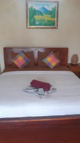 Een bed of bedden in een kamer bij Nami House