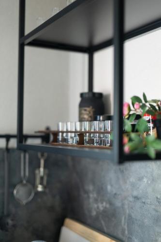 a kitchen with a counter top with pots and pans at Villa Jazz - Island Krk SPA Oasis in Krk