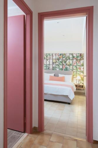 Katil atau katil-katil dalam bilik di Monemvasia Green Apartments