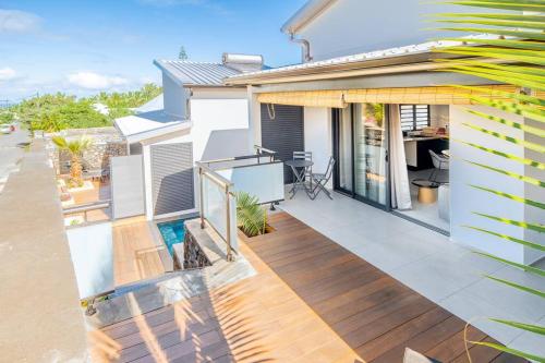 an image of a house with a deck at Villa standing 50 in Ravine des Cabris