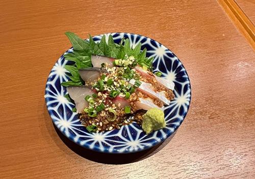 a blue and white plate of food on a table at TKP Sunlife Hotel in Fukuoka