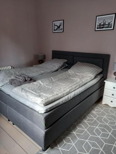 two beds sitting next to each other in a bedroom at 1 bedroom apartment, whole flat in Arvika