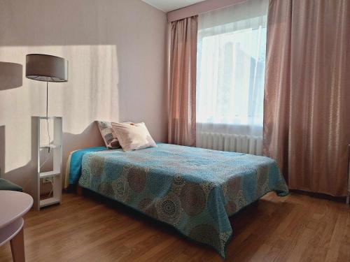 Ένα ή περισσότερα κρεβάτια σε δωμάτιο στο Maria Apartment Tolli