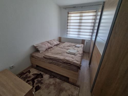 Postel nebo postele na pokoji v ubytování Apartman Baban 2