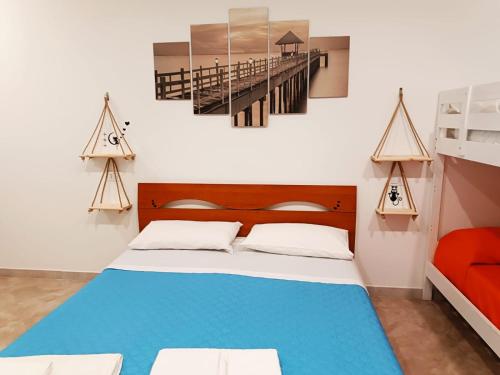 Postel nebo postele na pokoji v ubytování B&B il MENHIR