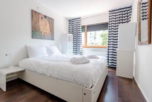 Voodi või voodid majutusasutuse Apartment Garden & Bed toas