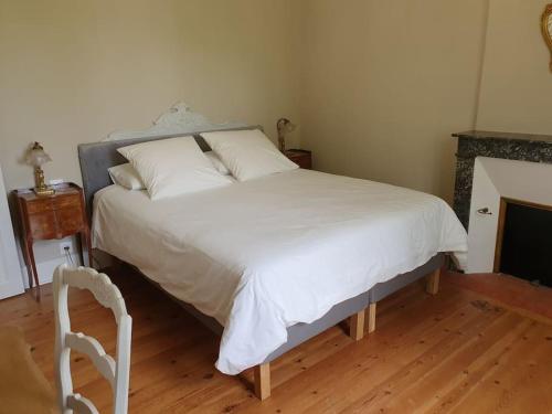 Ένα ή περισσότερα κρεβάτια σε δωμάτιο στο Cosy Billy - Appartement de charme