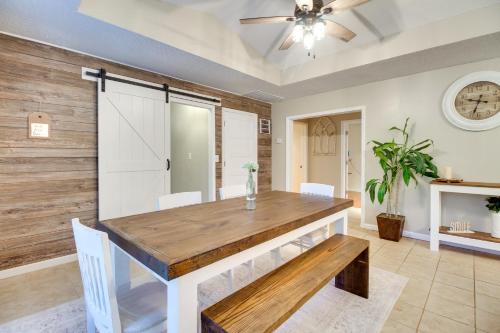 a dining room with a table and a ceiling fan at Southern Escape in Guyton Private Yard and Hot Tub! in Port Wentworth