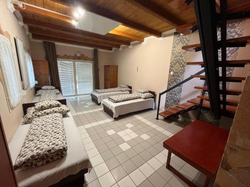 Katil atau katil-katil dalam bilik di Tiszavirág apartman