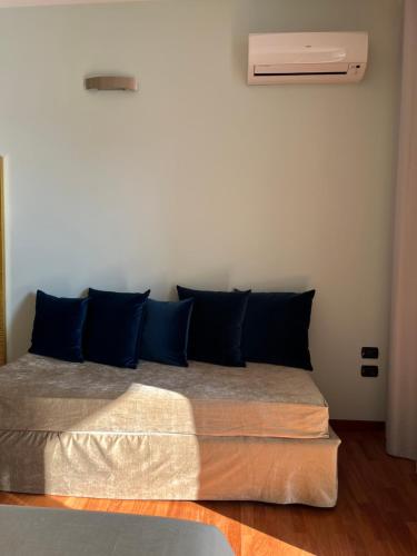 Ένα ή περισσότερα κρεβάτια σε δωμάτιο στο Camelia 12 Apartments