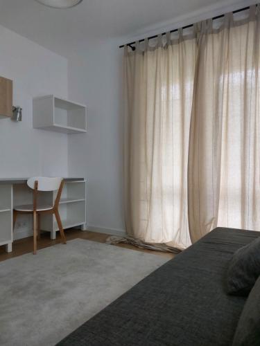 Ένα ή περισσότερα κρεβάτια σε δωμάτιο στο Apartamenty MK - Kredowa