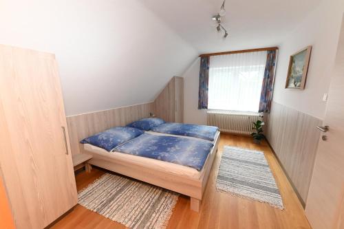 Cama o camas de una habitación en Privatzimmervermietung Fiausch