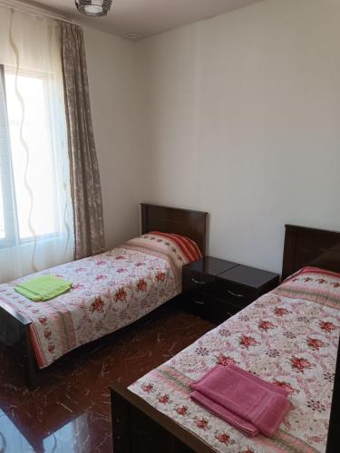 Postel nebo postele na pokoji v ubytování Aparthotel Sofia in Gonio