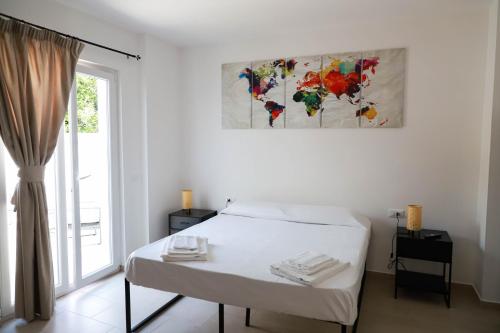 Ένα ή περισσότερα κρεβάτια σε δωμάτιο στο EG Apartments - Forio d'Ischia