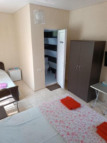 Postel nebo postele na pokoji v ubytování Aparthotel Sofia in Gonio