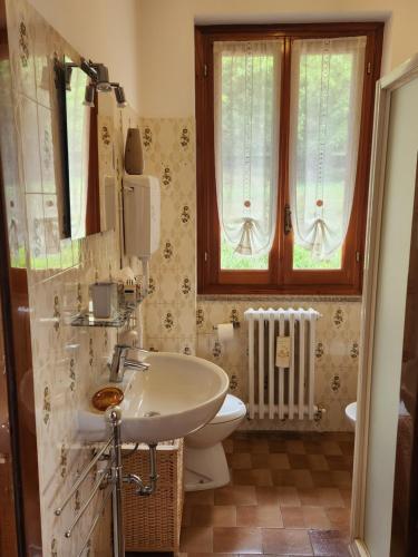 Ванная комната в L'ulivo Apartment immerso nella tranquillità