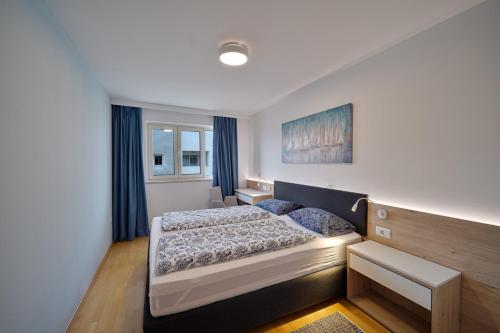 Ένα ή περισσότερα κρεβάτια σε δωμάτιο στο Edra Suite Apartment