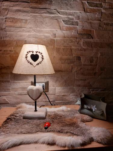 Postel nebo postele na pokoji v ubytování Chalet Lia