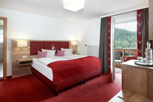 Postel nebo postele na pokoji v ubytování Hotel Kerschbaumer