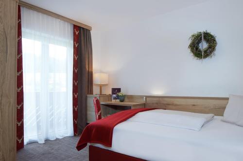 Cama o camas de una habitación en Hotel Kerschbaumer