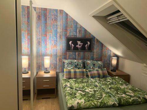 Un pat sau paturi într-o cameră la Copenhagen Smart Appartment