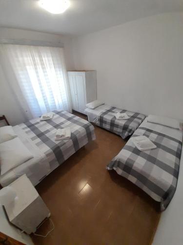 Ένα ή περισσότερα κρεβάτια σε δωμάτιο στο Casa Framida