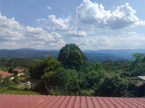 a view of the mountains from the roof of a house at Къща за гости Слънце Борики in Gabrovo