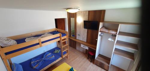 Postel nebo postele na pokoji v ubytování Hostel Casa Cinderella