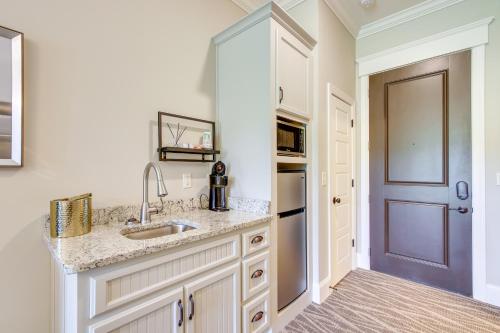 a kitchen with a sink and a counter top at Keestone Studio with Resort Amenities! 