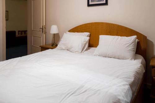 Mansouri Mansions Hotelにあるベッド