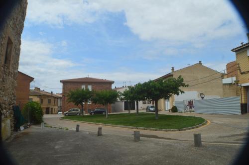 a view of a street in a small town at Casa Rural El Convento in Valtierra