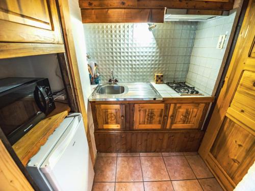 A cozinha ou kitchenette de Studio Tignes, 1 pièce, 4 personnes - FR-1-502-354