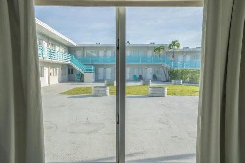 a view of a building from a window at The Biscayne Hotel in Miami