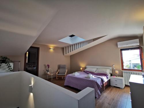 Postel nebo postele na pokoji v ubytování Via Subiaco Guest House