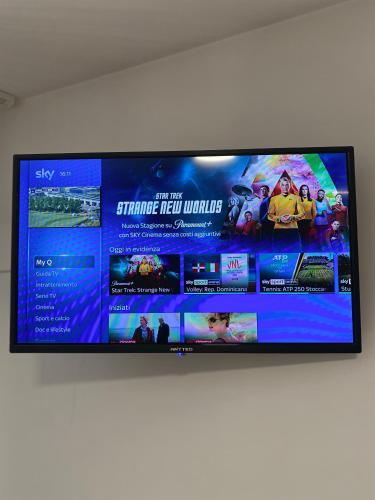 TV a/nebo společenská místnost v ubytování Casa Valentina 2