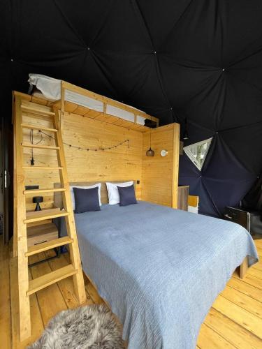 Voodi või voodid majutusasutuse Elia Glamping toas