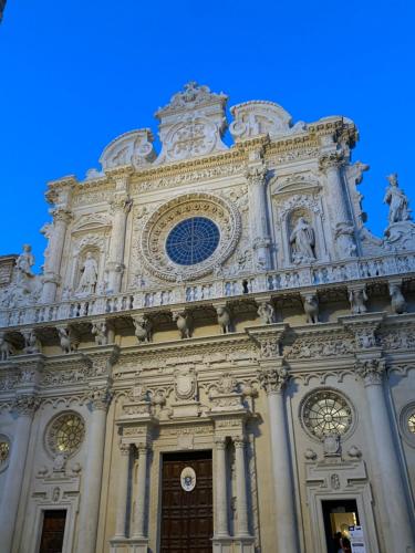 a large building with a blue sky in the background at Oriental Design Apartment nel centro di Lecce in Lecce