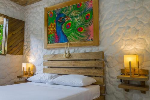 Ένα ή περισσότερα κρεβάτια σε δωμάτιο στο Hotel Cabañas Club Sierra Limón