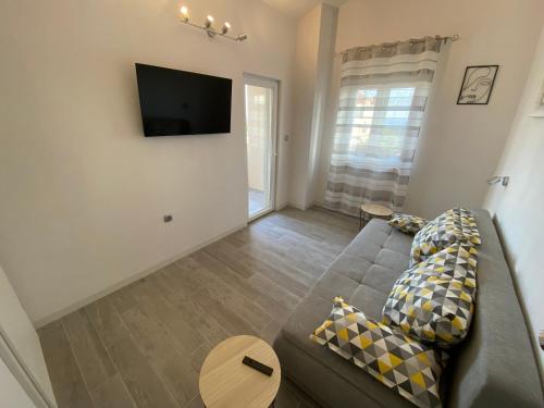TV a/nebo společenská místnost v ubytování Hvar Apartments Felix