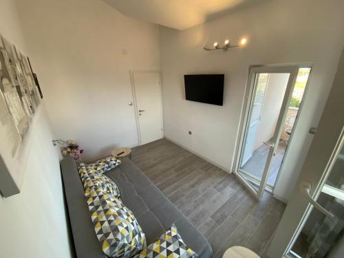 TV a/nebo společenská místnost v ubytování Hvar Apartments Felix