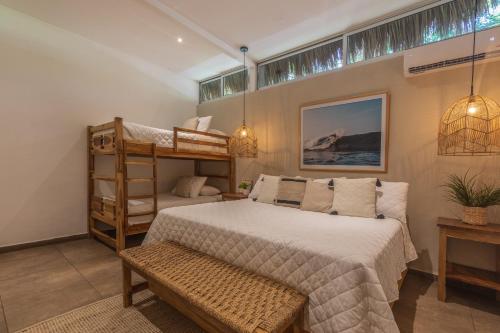 Ένα ή περισσότερα κρεβάτια σε δωμάτιο στο Hotel Michanti