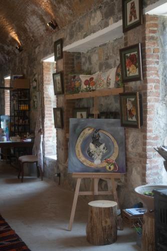 a room with a painting on a table in a room at IZZ Getaway - Adults Only in Göcek