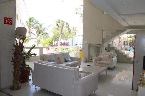 Un lugar para sentarse en Rocamar Hotel Isla Mujeres