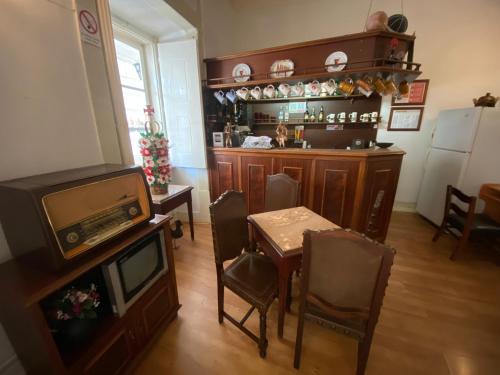 Η κουζίνα ή μικρή κουζίνα στο União - Guest House